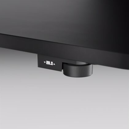 Height adjustment switch on the Herman Miller Coyl Gaming Desk