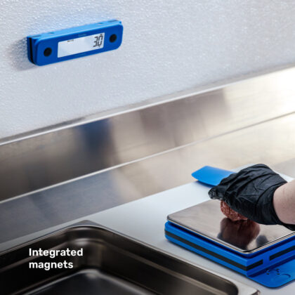 ThermoWorks Gravitas blue display attached to a metal surface with integrated magnets