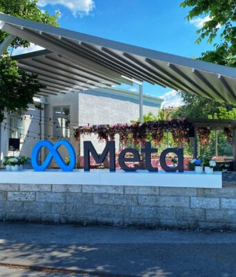 Meta Reportedly Begins 8,000 Job Cuts in AI Efficiency Push Meta layoffs editorial image from Meta i Almedalen on Wikimedia Commons