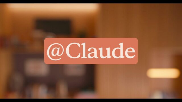 Anthropic official Claude Tag announcement graphic showing the @Claude tag over a warm office setting.