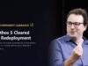 Anthropic CEO Dario Amodei speaking at TechCrunch Disrupt 2023 on a Tech My Money graphic about U.S. government clearance to redeploy the Mythos 5 cybersecurity model