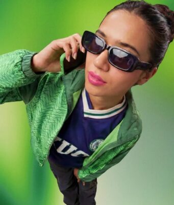 Cash App Mobile turns your phone bill into a $40 app plan Person holding a phone against a green Cash App Mobile announcement background