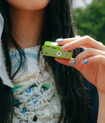 The Kodak Charmera Goes Y2K With New Millennium Designs A lime-green Kodak Charmera Millennium Edition keychain camera, one of the new Y2K-inspired designs