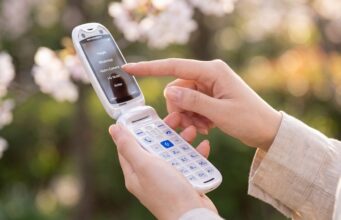 Commodore’s Callback 8020 Is A Retro Flip Phone With Modern App Tricks Commodore Callback 8020 flip phone open in a person's hand.