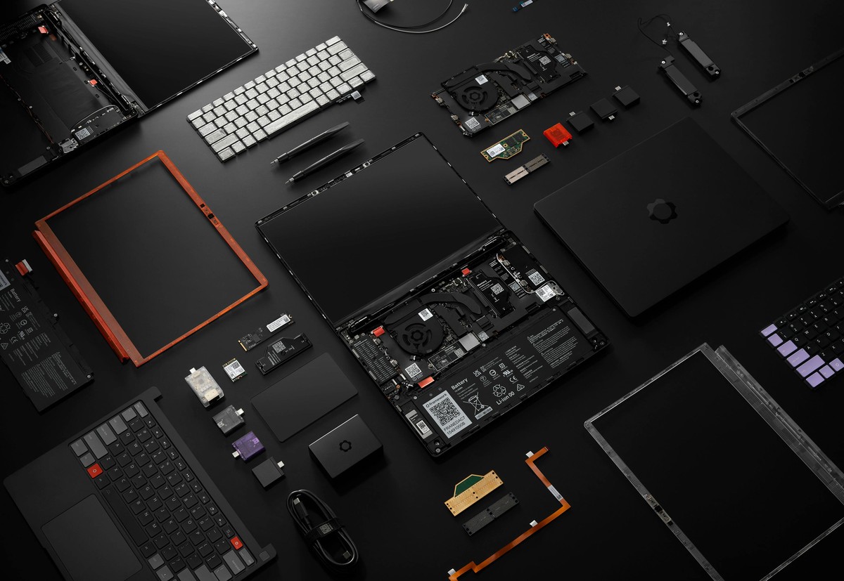 Framework Laptop 13 Pro teardown showing the modular internals behind the new haptic touchpad and display