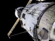 International Space Station Zvezda service module with a Progress spacecraft docked nearby