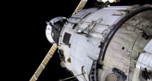International Space Station Zvezda service module with a Progress spacecraft docked nearby