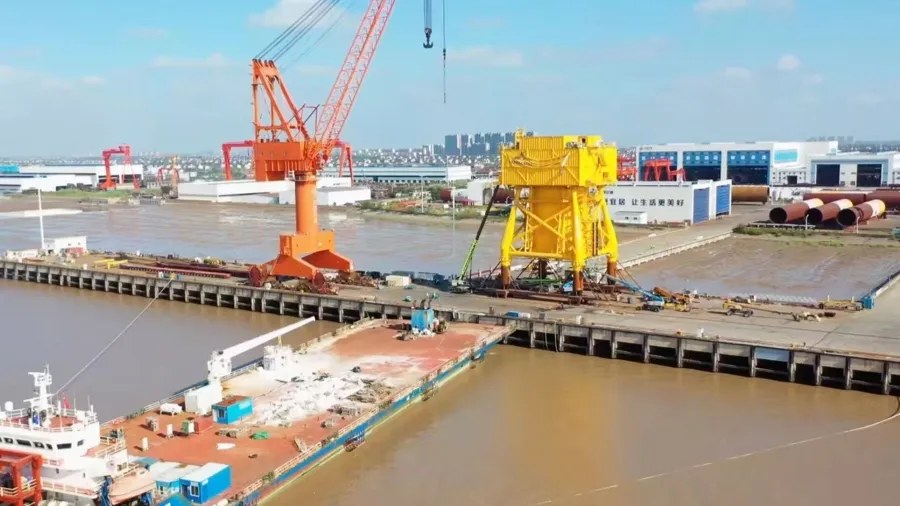 Yellow underwater data center structure on the dock at Shanghai's Lin-gang Special Area