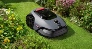 MOVA LiDAX Pro 800 robotic lawn mower cutting grass in a garden