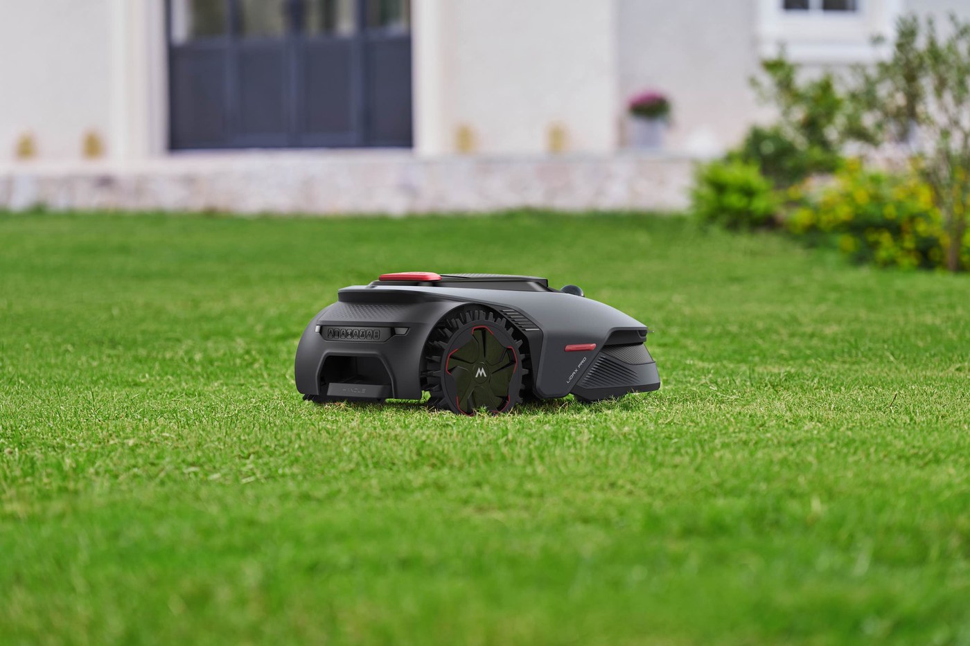 Side view of the MOVA LiDAX Pro 800 robotic lawn mower on grass