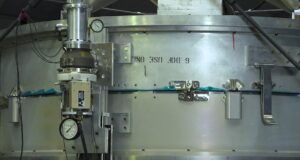 NASA engineers at Marshall Space Flight Center testing a cryocoupler device for in-orbit spacecraft refueling
