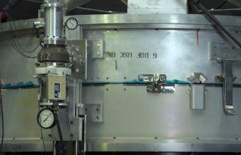 NASA engineers at Marshall Space Flight Center testing a cryocoupler device for in-orbit spacecraft refueling
