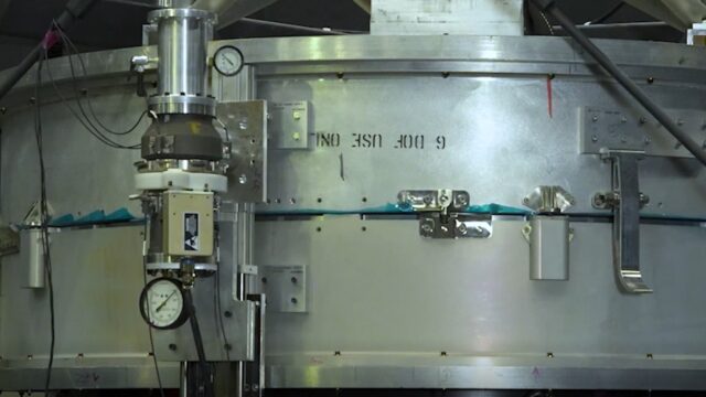 NASA engineers at Marshall Space Flight Center testing a cryocoupler device for in-orbit spacecraft refueling
