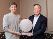 Sam Altman and Broadcom president Hock Tan holding the OpenAI Jalapeno inference chip wafer