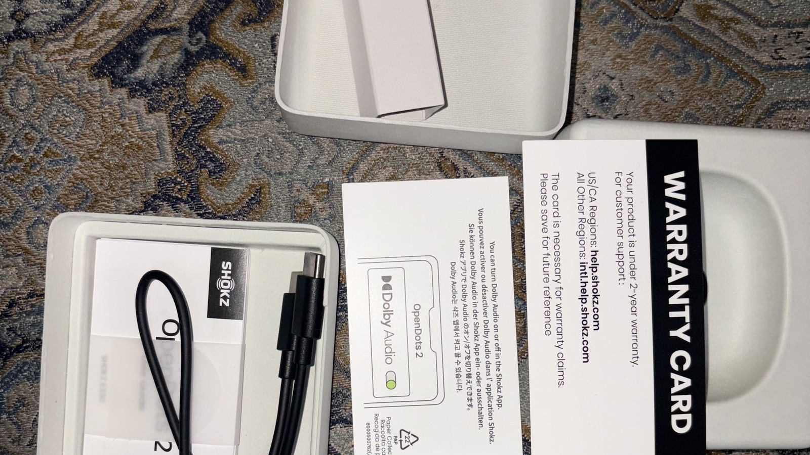 Shokz OpenDots 2 box contents and accessories in 16:9 format