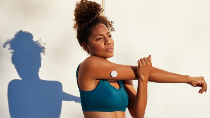 Ultrahuman M2 Live Drops the Prescription for Glucose Tracking A person wearing the Ultrahuman M2 Live continuous glucose monitor sensor on their upper arm