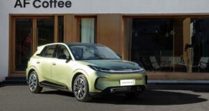 Arcfox Beta T1 electric hatchback in Shadow Green, front three-quarter view