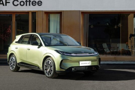 Arcfox Beta T1 electric hatchback in Shadow Green, front three-quarter view