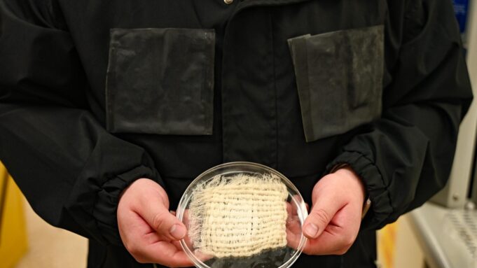 This UT Austin Jacket Harvests Drinking Water Straight From the Air Water-harvesting jacket prototype with hydrogel panels and a fabric sample at UT Austin