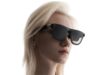 XREAL Aura Reservations Open With A $1,500 Price Ceiling Woman wearing XREAL Aura Android XR glasses in a close-up official XREAL product image.