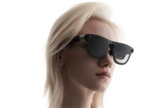 XREAL Aura Reservations Open With A $1,500 Price Ceiling Woman wearing XREAL Aura Android XR glasses in a close-up official XREAL product image.