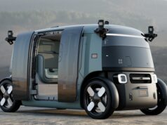 Zoox robotaxi with open doors showing the updated production-intent design