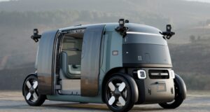 Zoox robotaxi with open doors showing the updated production-intent design
