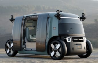 Zoox robotaxi with open doors showing the updated production-intent design