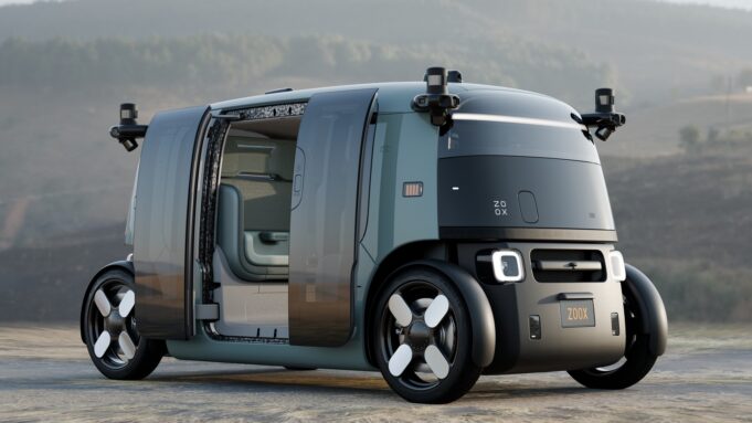 Zoox’s Updated Robotaxi Is Built for a Bigger Ride-Hailing Push Zoox robotaxi with open doors showing the updated production-intent design