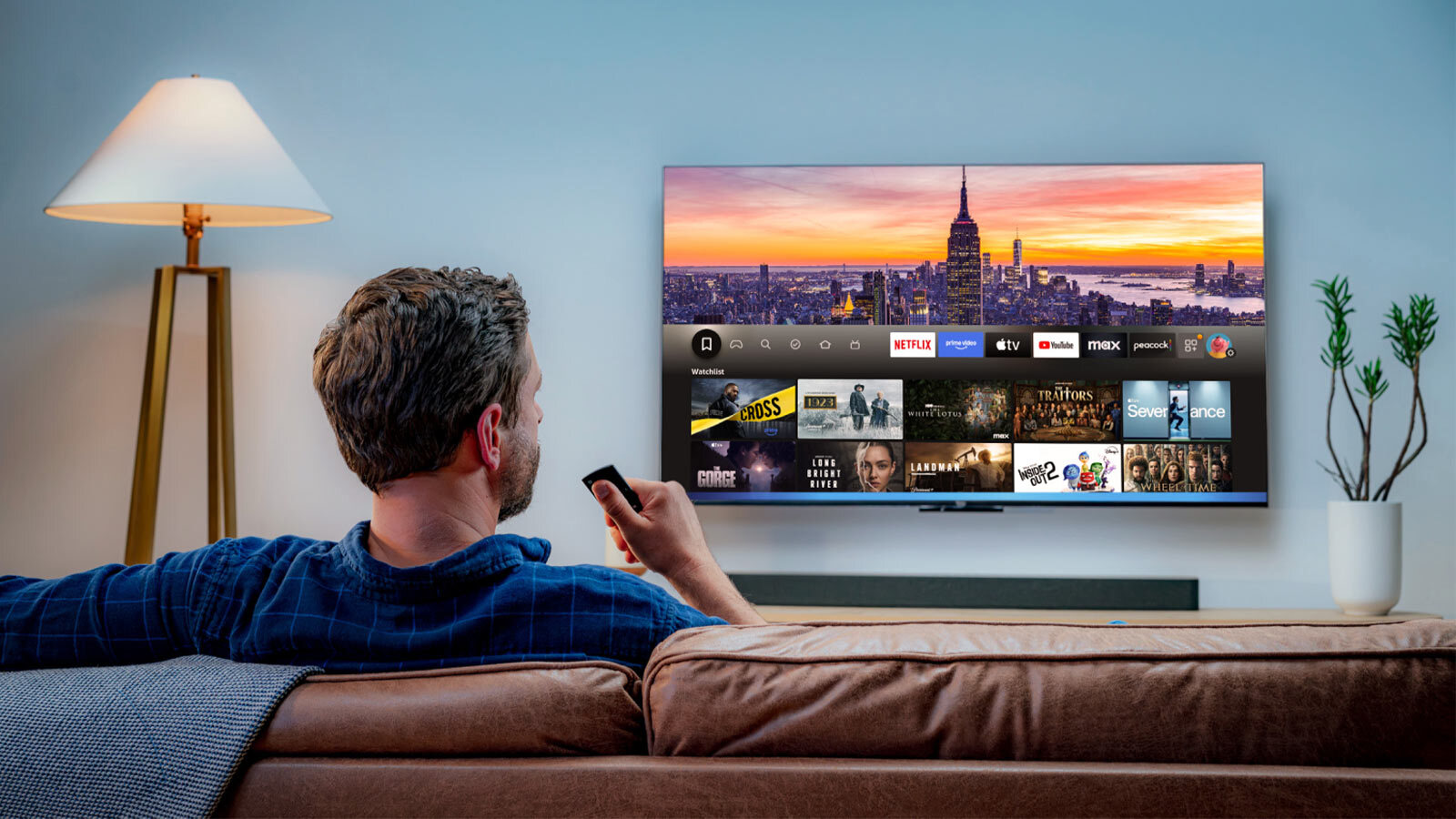 Amazon Fire TV interface showing streaming apps and search on a living room TV
