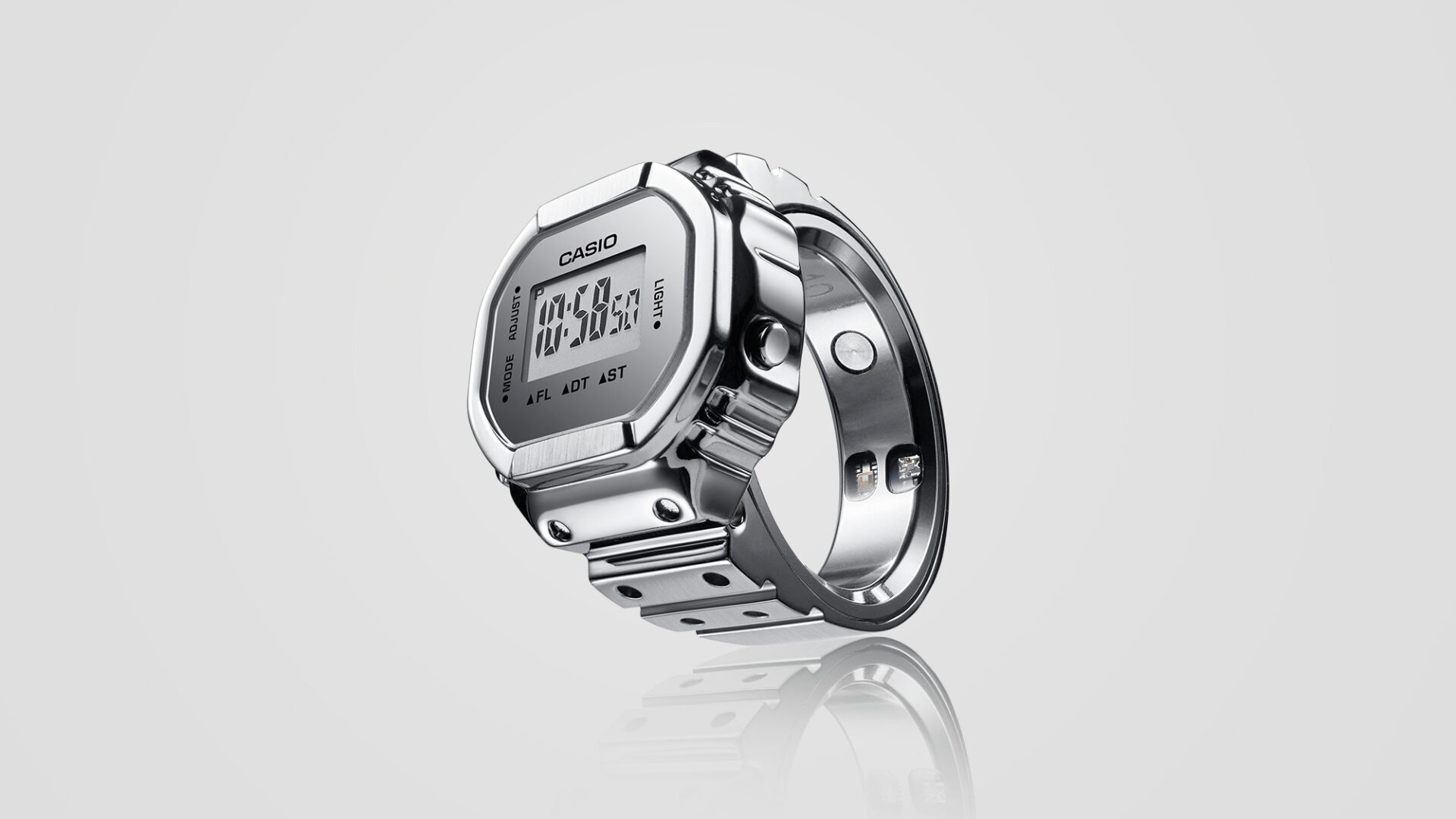 Casio CRW-H001 ring watch worn on hand showing digital face