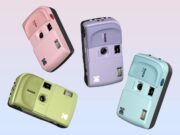 Four Kodak EC35 35mm film cameras in pink, lavender, green, and blue color options