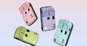Four Kodak EC35 35mm film cameras in pink, lavender, green, and blue color options