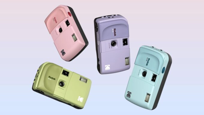 Four Kodak EC35 35mm film cameras in pink, lavender, green, and blue color options