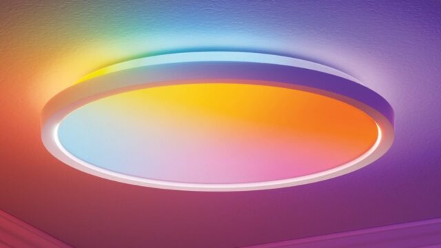 Nanoleaf Smart Multicolor Ceiling Light flush-mounted circular fixture showing dual-sided illumination in dynamic colors