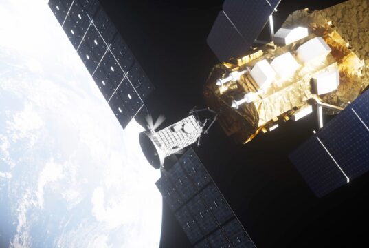 NASA Swift rescue mission: artist's concept of Katalyst's LINK spacecraft approaching the Neil Gehrels Swift Observatory above Earth