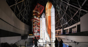 Rendering of Space Shuttle Endeavour standing in launch position inside the Samuel Oschin Shuttle Gallery