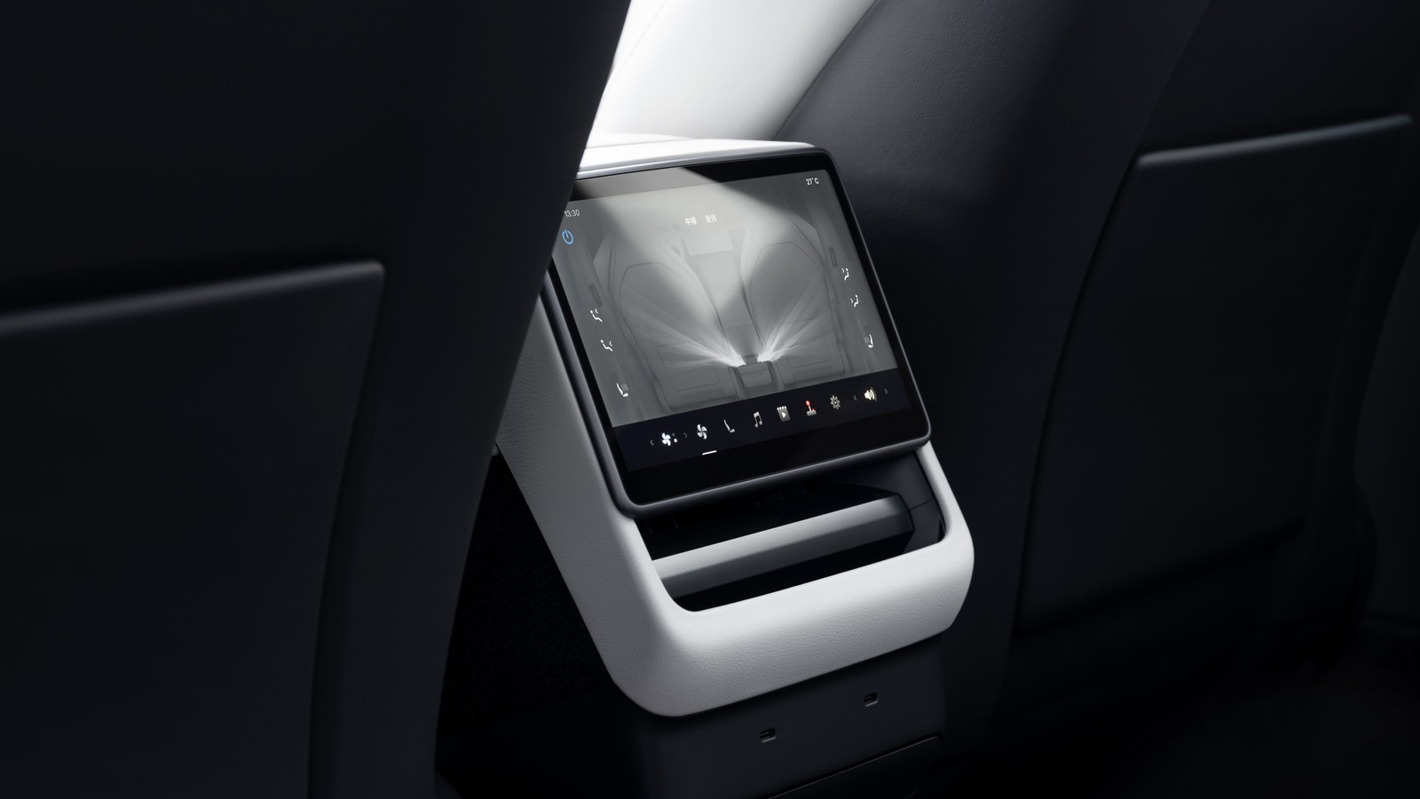 Tesla Model Y Long Wheelbase second-row 8-inch touchscreen between the front seats