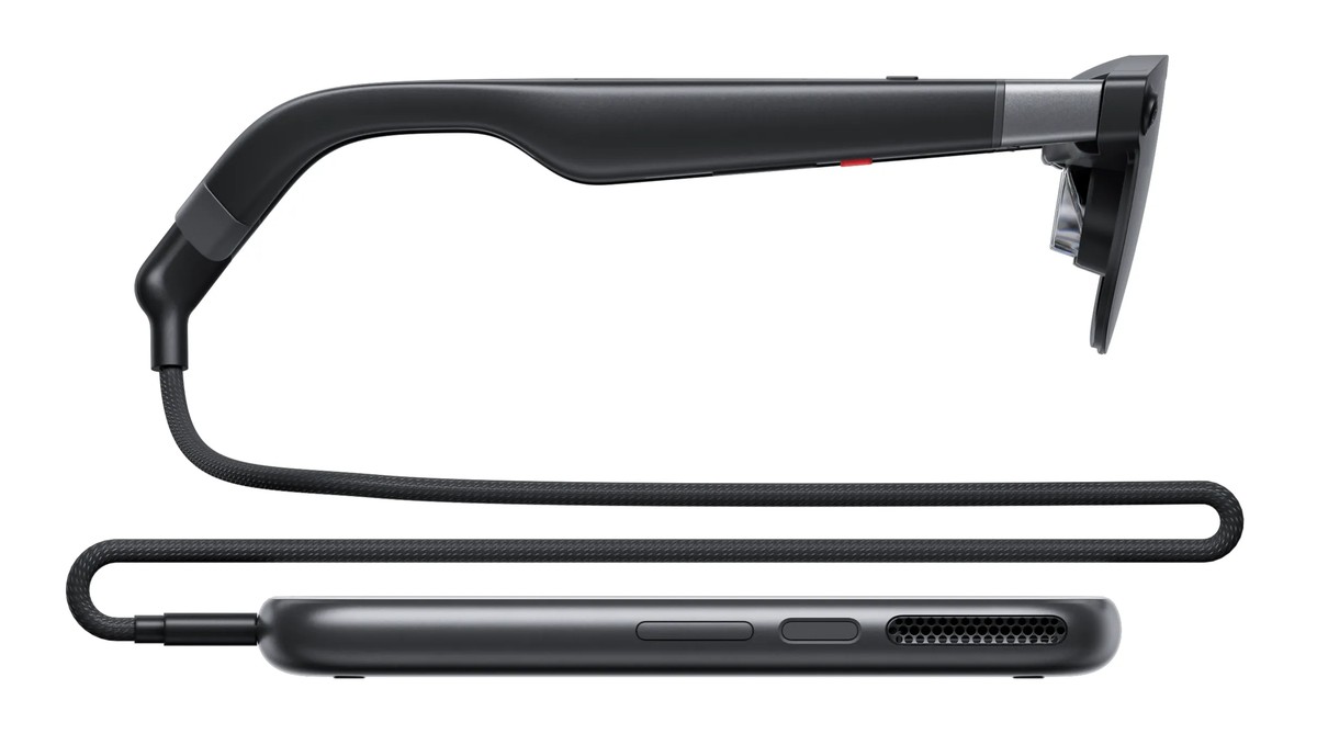 XREAL Aura glasses beside the tethered compute puck