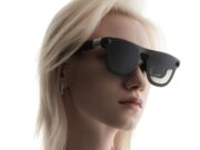 XREAL Aura Android XR glasses worn by a model, official press image