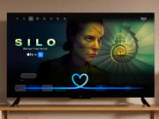 Fire TV home screen showing Alexa Plus conversational waveform over a Silo title card