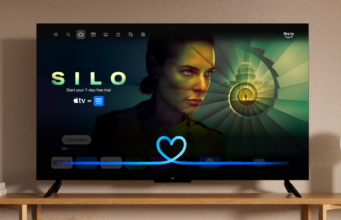 Alexa Plus Is Now Free on Compatible US Fire TV Fire TV home screen showing Alexa Plus conversational waveform over a Silo title card