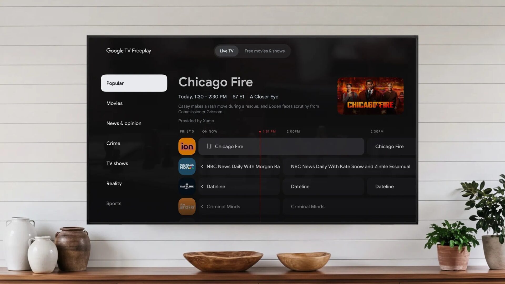 Google TV Freeplay Live TV tab showing a Chicago Fire guide with news, crime, and sports rows