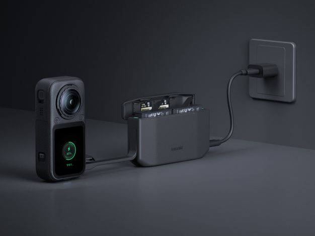 Insta360 X6 charging on the official hub with a spare Xtreme Battery in the dock