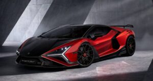 Official three-quarter studio shot of the red and black Lamborghini Revuelto SV