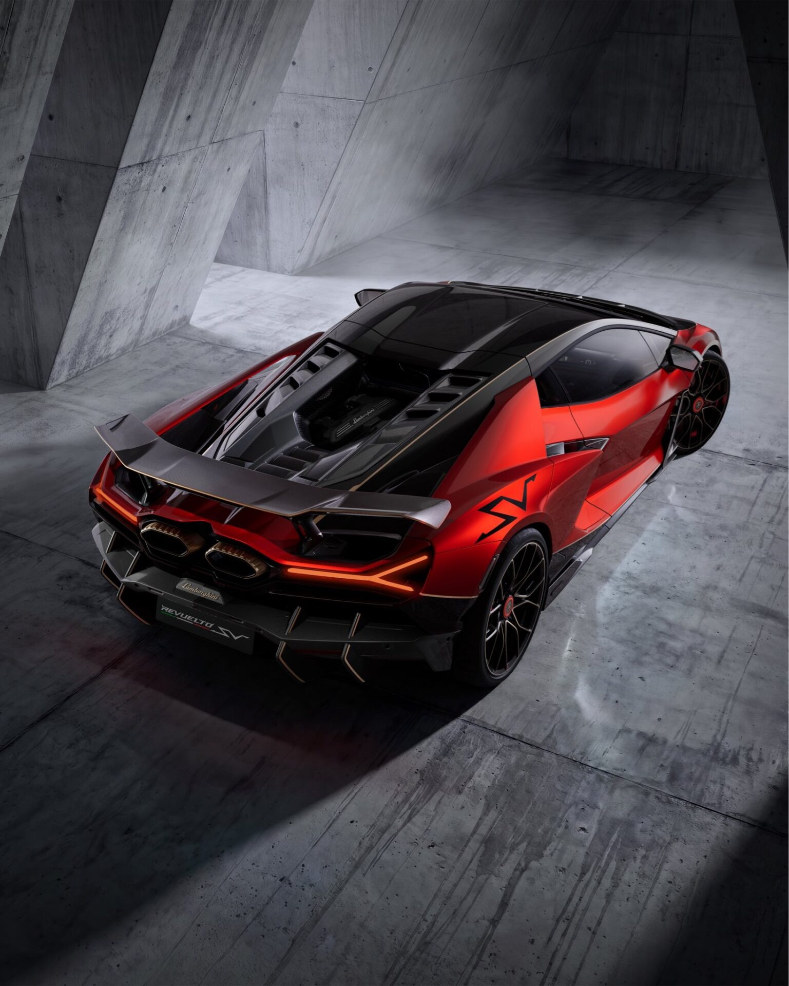 Official rear three-quarter of the Lamborghini Revuelto SV with fixed wing and dual exhausts