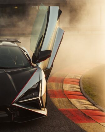 Official Lamborghini Revuelto SV with scissor door open on a curb