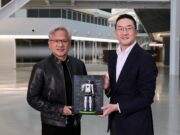 Jensen Huang and LG chairman Kwang Mo Koo hold a signed LG NVIDIA humanoid robot plaque