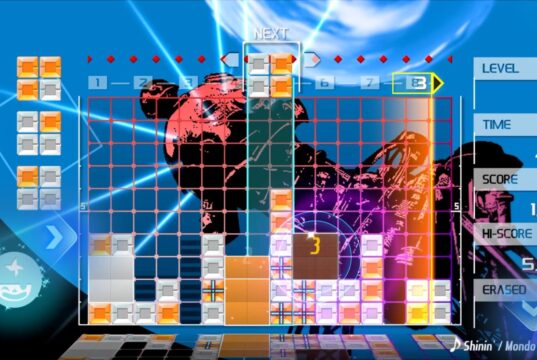 Official Lumines Remastered mobile screenshot of orange and white blocks on a blue stage