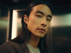 Sennheiser Momentum True Wireless 5: Specs and Price Person wearing Sennheiser Momentum True Wireless 5 earbuds in white